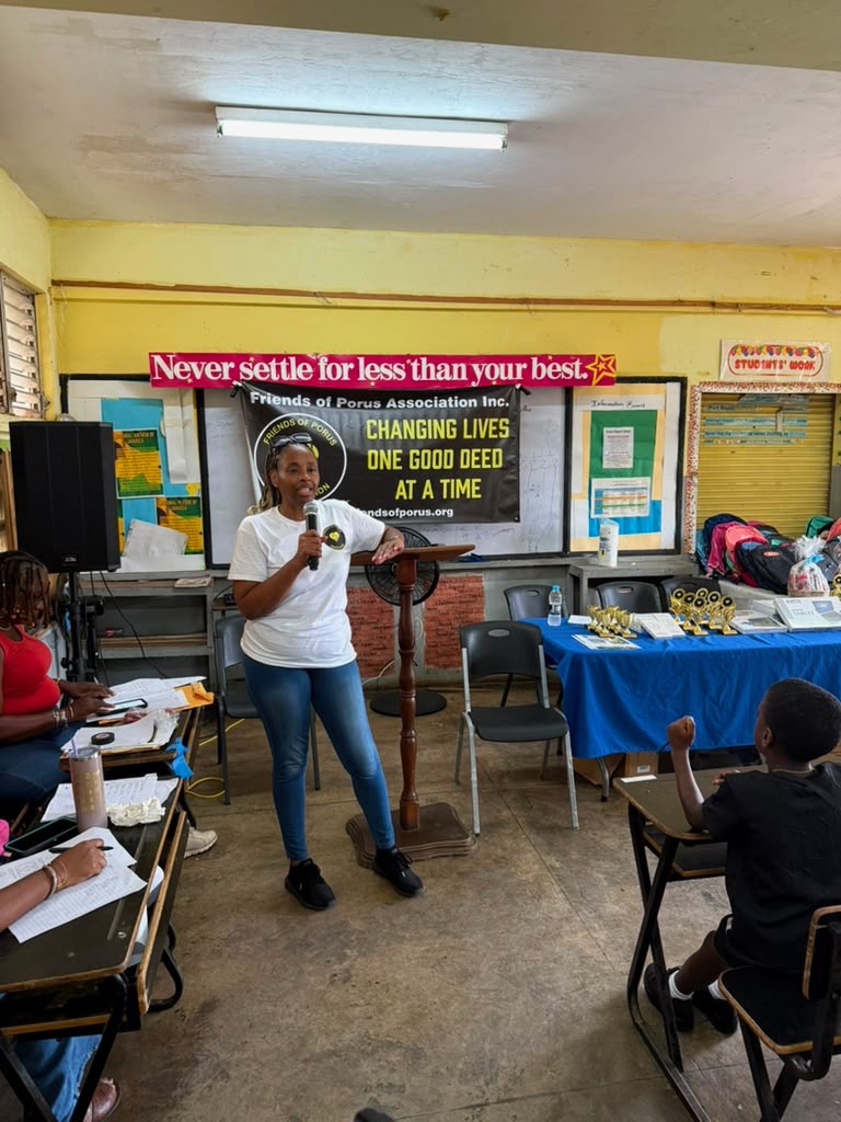 Camile Matar, Madam Secretary of Friends of Porus, speaking at a Porus community event